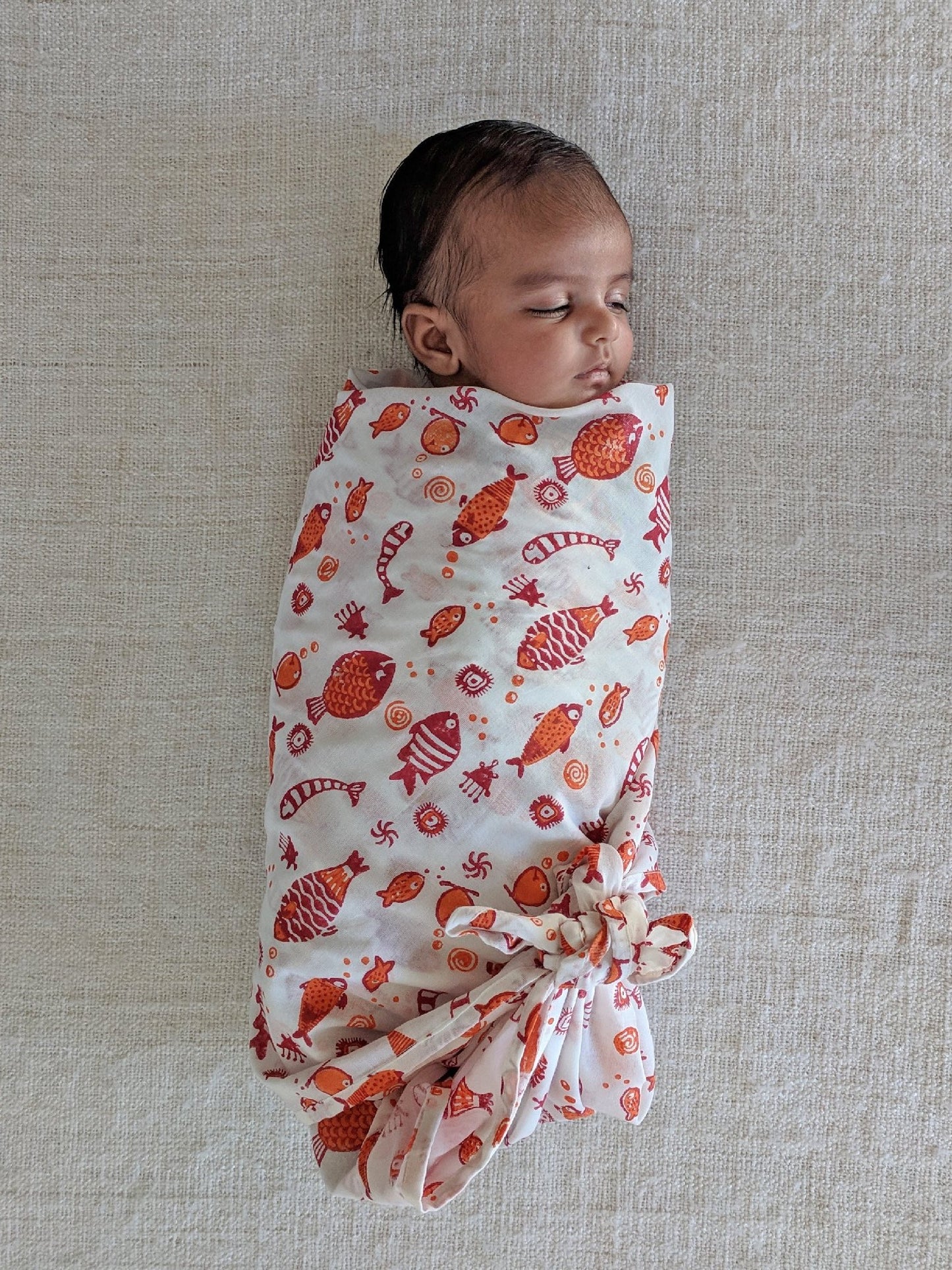 Koi Muslin Swaddle Wrap.