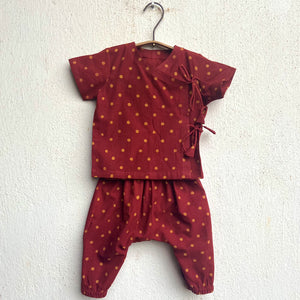Handcrafted Indian kidswear featuring organic cotton Angrakha and pants, dyed with natural madder.