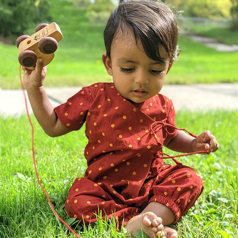 Unisex organic cotton Madder Handblock Angrakha top and pants set for eczema-prone skin, perfect for baby’s first puja or any special occasion.